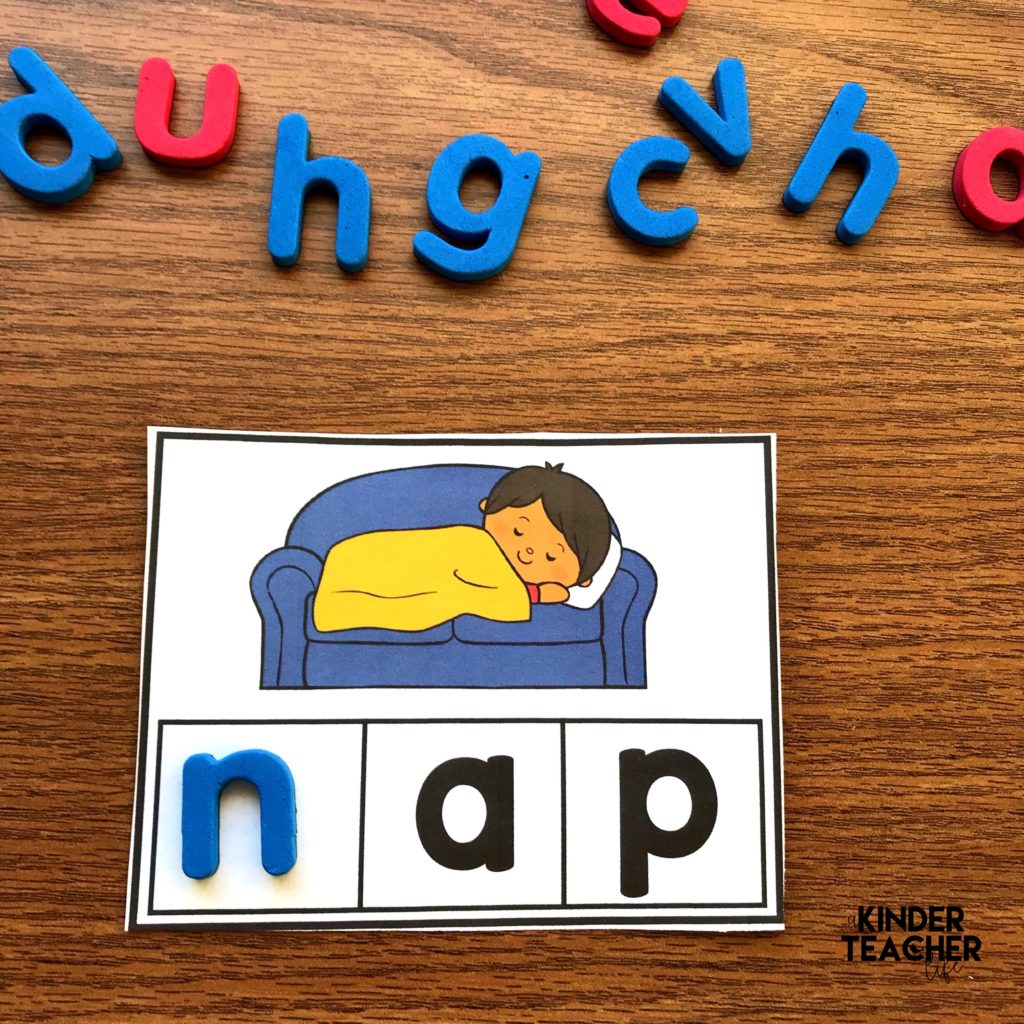 Students build words by using magnetic letters to fill in the missing letter or letters. 
