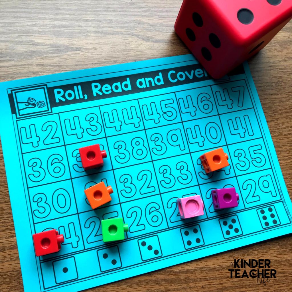 Counting to 100 activity - Students roll the die, pick a number to read in that column and cover it. This is a great partner activity!